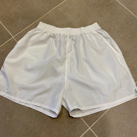 Reebok Pants - Women’s Reebok white running sport short.